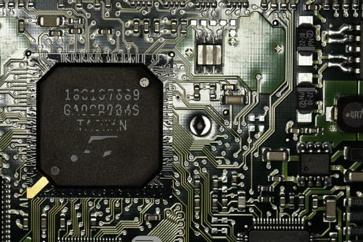 Close view detail of a circuit board with chips.