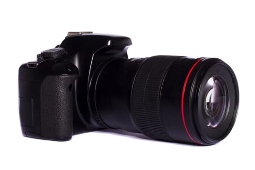 Close view of a modern photographic DSLR camera isolated on a white background.