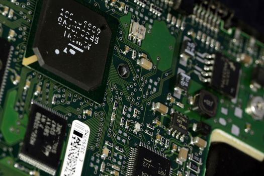 Close view detail of a circuit board with chips.
