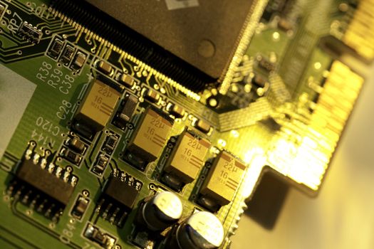 Close view detail of a circuit board with chips.