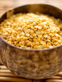 close up of a bowl of yellow split peas