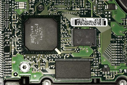Close view detail of a circuit board with chips.