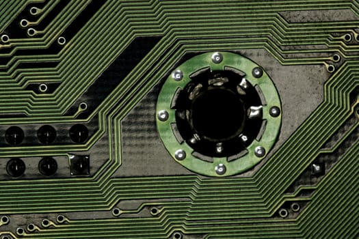 close view detail of   computer circuit chips on a golden light.