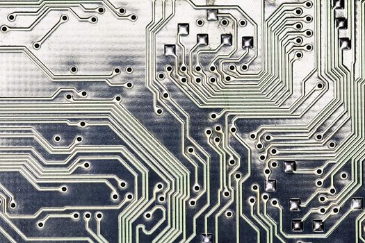 close view detail of   computer circuit chips on a golden light.