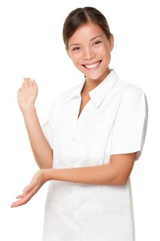 Massage therapist / beautician. Spa care woman showing copyspace on white background.