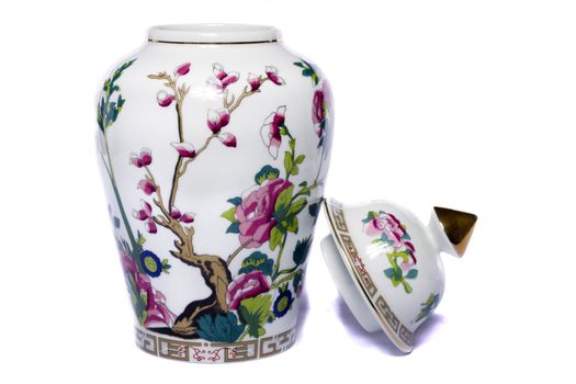 Close up view of a urn ceramic vase isolated on a white background.