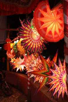 Beautiful lanterns in bright colors put for decoration on the streets.