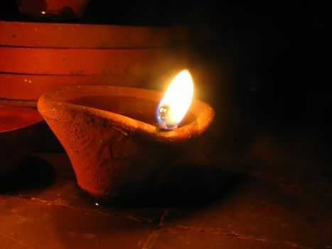 A holy lamp lit on the occassion of a Hindu festival in India.