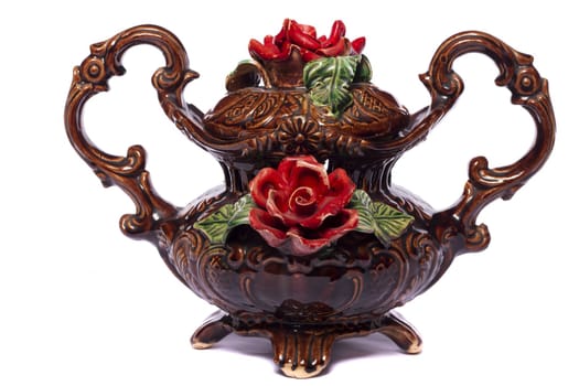 Close up view of a brown decorative vase isolated on a white background.