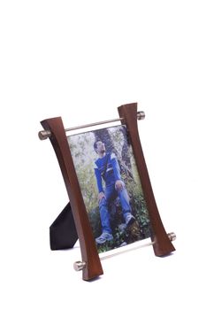 Close up view of a picture frame with photo isolated on a white background.
