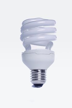 View of a energy efficiency light bulb isolated on a white background. 