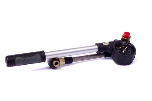 Close up view of a bicycle air pump isolated on a white background.