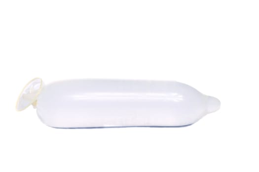 Close view of a condom isolated on a white background.