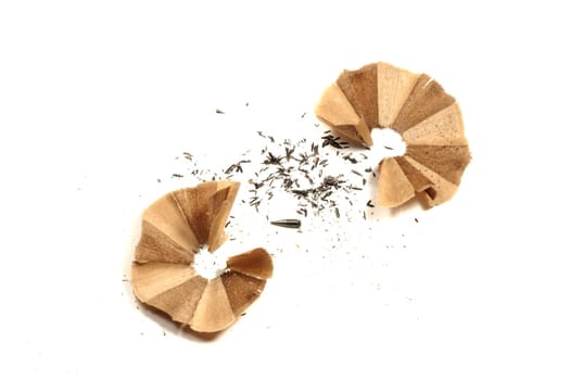 Close view detail of shavings of pencil sharpeners isolated on a white background.