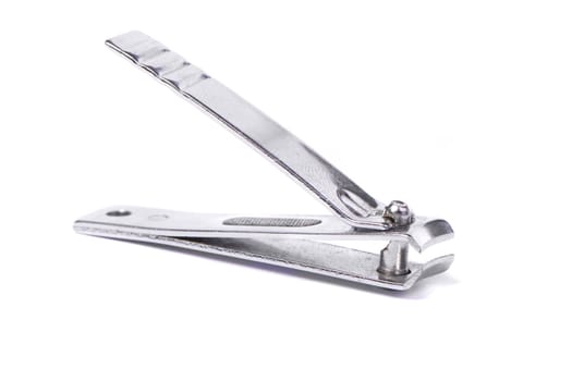Close up view of a nail clipper isolated on a white background.