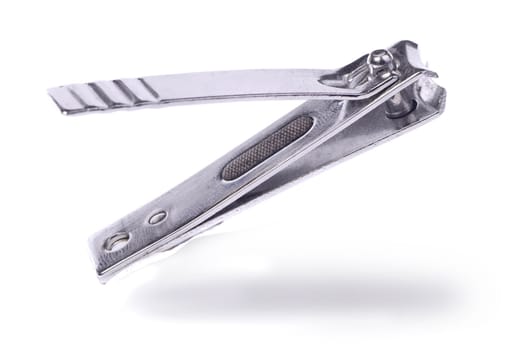 Close view of a nail clipper isolated on a white background.
