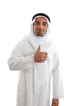 Arab, or other middle eastern ethnic man wearing traditional clothing, smiling and giving thumbs up success hand sign.  White background.