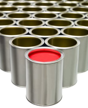 Red Paint can in front of a large group of Empty Paint Cans