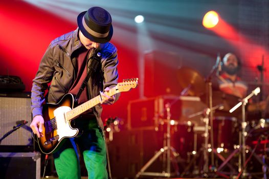 CANARY ISLANDS - SEPTEMBER 30: Guitarist Alby Ramirez from the band The Good Company during Heineken Music Fest September 30, 2011 in Las Palmas, Canary Islands, Spain
