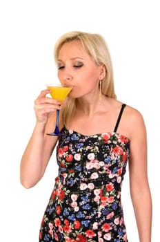 Girl drinks cocktail from glass isolated on white background.