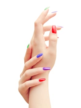 woman hands with multicolored nails against the white background 