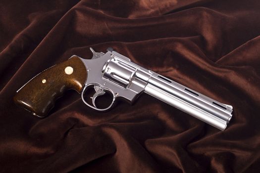 Close up view of a airsoft gun isolated on a white background.
