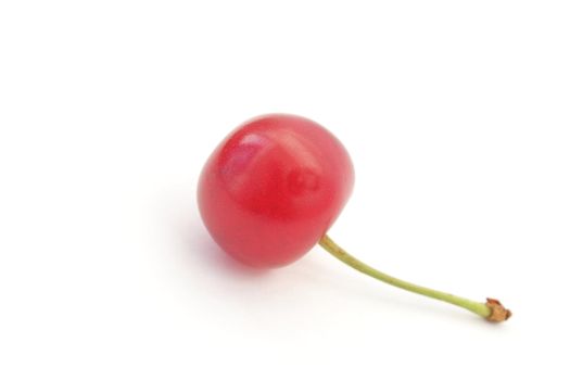 Single ripe cherry isolated on white background