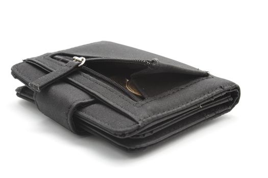 Black wallet with opened pocket and coins inside