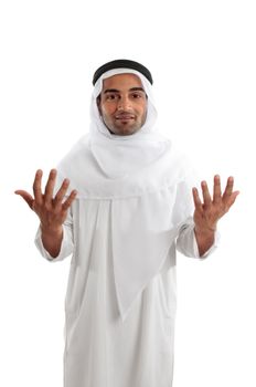 An arab or ethnic man  shrugging or communcating with hands out.  White background.