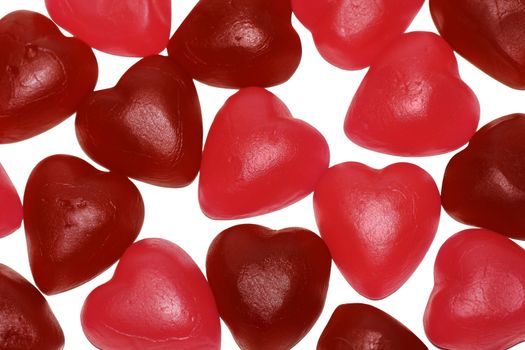 Valentine's day background: sweet pink and red heart shaped candy.