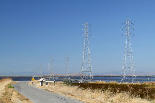 High voltage power lines near the bicycle track
