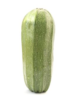 Single green zucchini isolated on white background