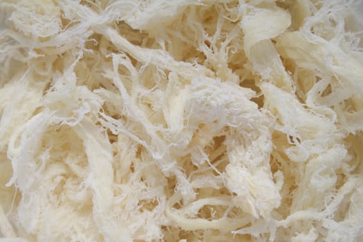 Closeup photo of dried squid meat, view from above