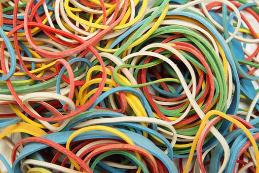 Rubber bands of various colours as a background
