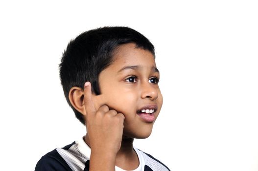 an handsome young indian kid thinking about something