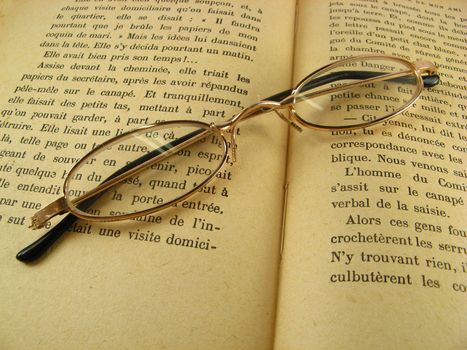 an image of some glasses on a book