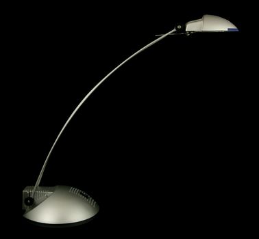 Halogen desk lamp isolated on black