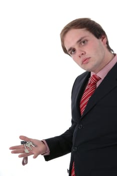 business man portrait with car keys in the hand