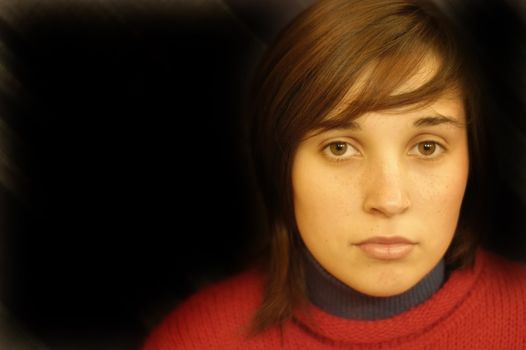 young lovely girl portrait in a dark background