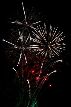 Finale fireworks, with white flares over black