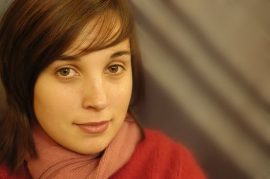 young casual woman in a dark background