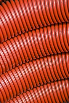 Close-up of red plastic pipes