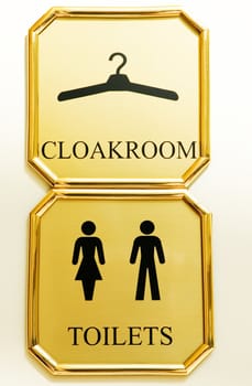 Pointer of a cloakroom in hall of inn