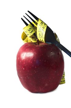 apple, autumn, centimeter, centimetre, crutch, cutlery, diet, drew, drop, eat, fall, fork, fruit, loose, measure, prong, red, vitamin, water, weight, yellow, 