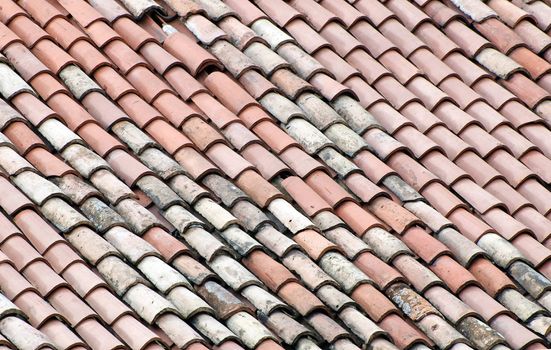 New and old roof tiles