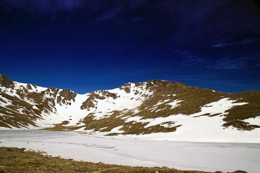 Colorado Mountain with snow against a blue sky in Colorado