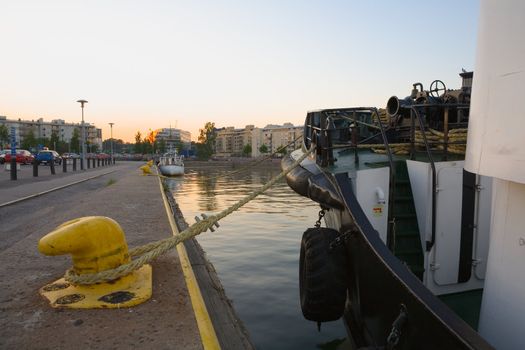 Ship in industrial harbor