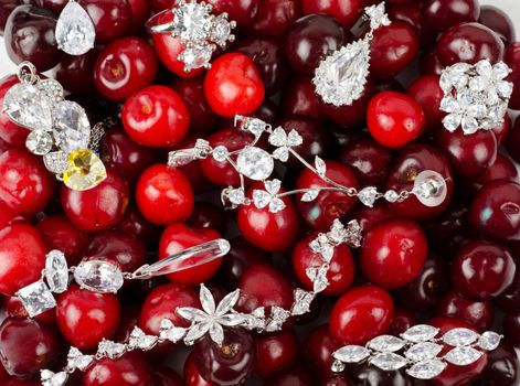 Jewels at fruit red ripe cherries berry background