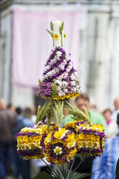 Beautiful procession of torches decorated with flowers, held in S.Bras de Alportel, Portugal.
