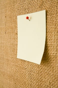 Blank note on a bulletin board